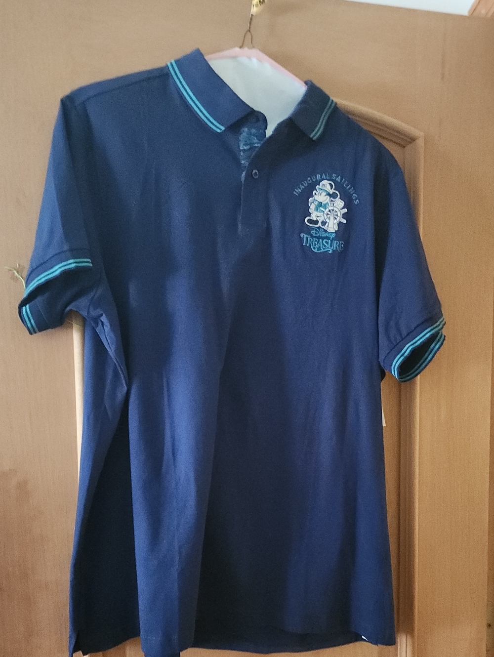 Disney Navy Polo Shirt with Teal Trim Treasure Inaugral Line